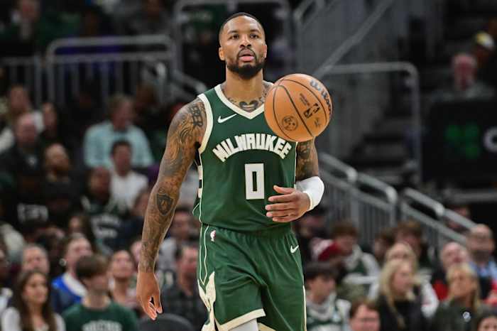 Milwaukee Bucks guard Damian Lillard (0) brings the ball down court